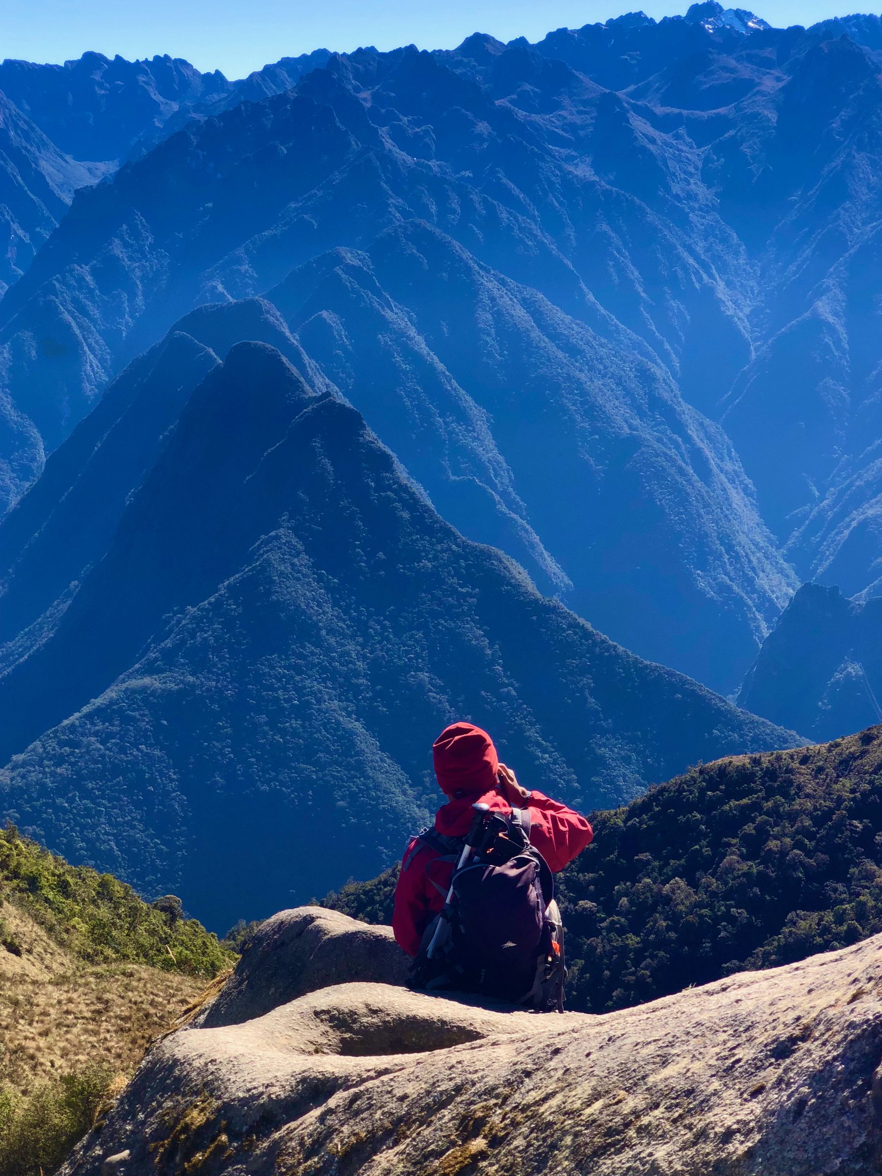 Guide in Red Sweatshirt Finds Cell Service in the Andes Mountains